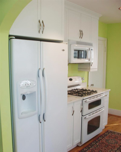 Appliances blend in with the cupboards for a seamless kitchen remodel
