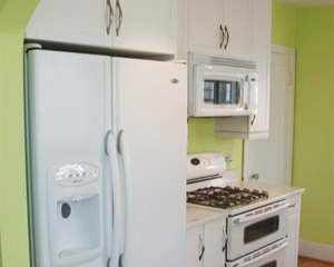 Appliances blend in with the cupboards for a seamless kitchen remodel