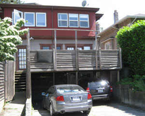 Before: a funky configuration and a deck/carport that had seen better days.  The basement was largely unfinished