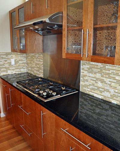 Cooktop with Seattle custom kitchen cabinet