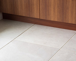 Tile also features prominently in the kitchen and dining room areas, chosen specifically knowing how much sand may be tracked into the house