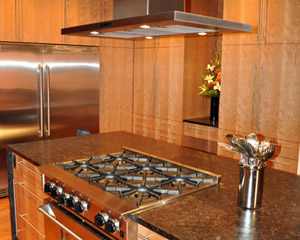 The range hood required a custom-built shroud to create a seamless connection with the ceiling
