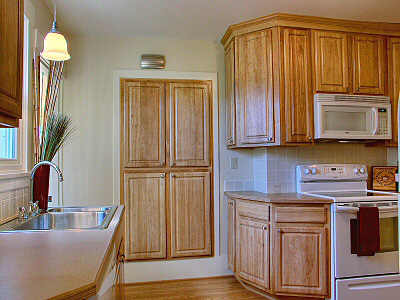 The kitchen remodel features an addition of functional storage space