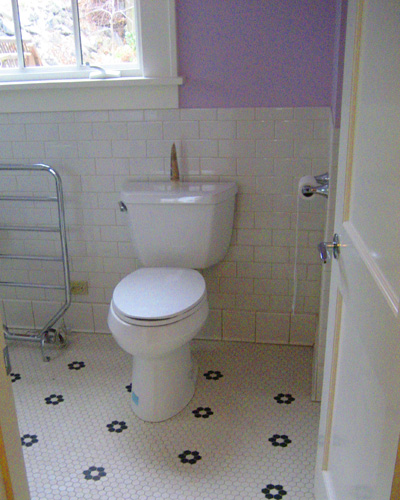 The kid's bath with a hex tile floor, hexagon tile bathroom Seattle