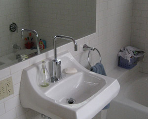A smaller sink is added to the kids bath remodel to maximize space usage