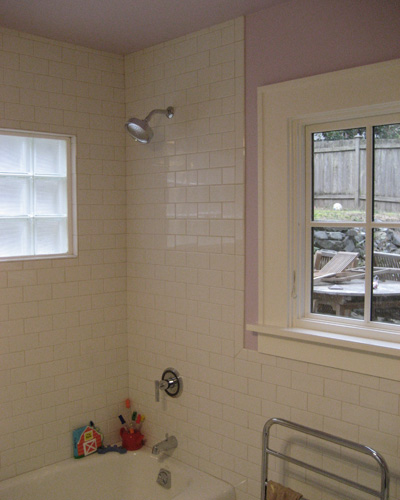 New windows and glass blocks add light to the room, custom tile bath Seattle
