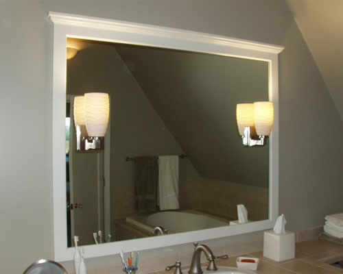 A mirror adds space to the bathroom remodel Seattle