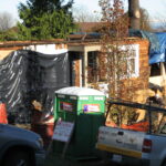 Tarps on the job: the sure sign of construction during the winter in Seattle.