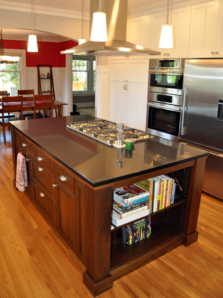 custom cabinets with stained cherry island and quartz counter