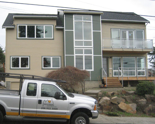 With modern lines and materials, this second story addition on a 1950s rambler is a complete transformation, a modern addition Seattle