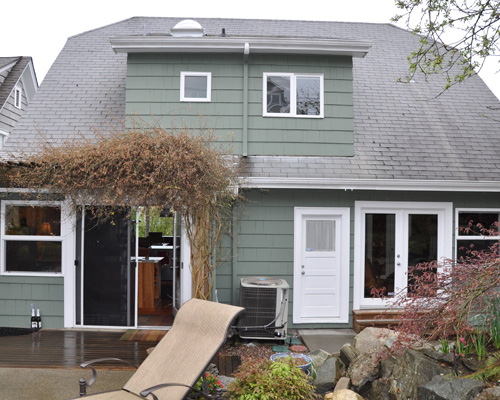 Before: the rear of the home.  Oh, and keep an eye on the white door with the window at the top.  You'll see it again