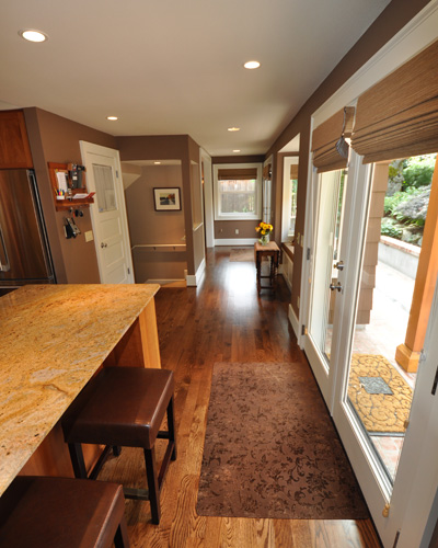 There's the exterior door again to the left.  It was repurposed as an interior door to the kitchen pantry.  A nod toward the old and a love of the new.  It was the owner's goal for this project, and beautifully reached