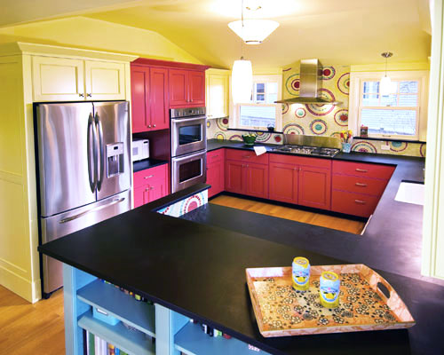 This kitchen doesn't just look good - it's made for production.  Low-maintenance Paperstone counters, a warming drawer, and a two-drawer dishwasher make the kitchen look great during dinner parties and the cleanup easy