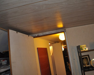 With the ceiling fixed below collar ties, the head height was a real challenge for the clients, who are both tall