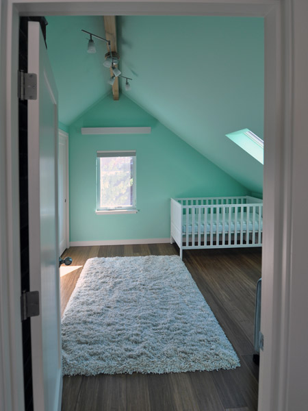 The nursery also benefits from added closet space carved out of the side attic