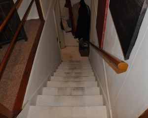 The final piece of the project is the stairwell.  The original stair plan included a wall closed to the living room, with a closet-like door leading to it