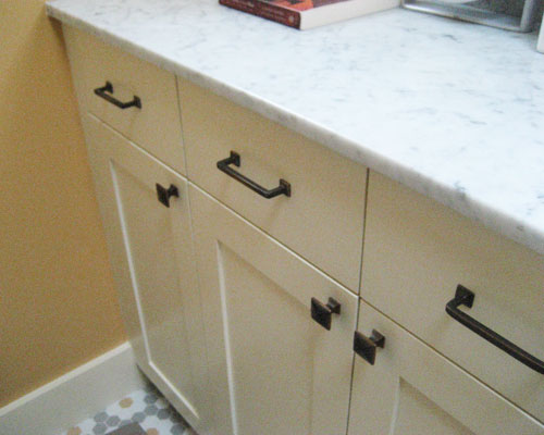 Oil-rubbed bronze finish on the hardware throughout brings each area of the remodel together