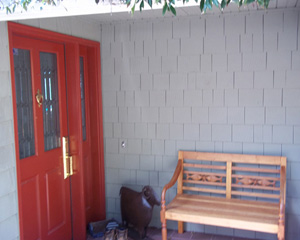 Before: A cottage style entry with brassy leaded glass