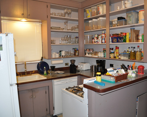 The driving need for the addition was threefold:  this kitchen still had the original cabinets, and was cramped and hard to work in; the clients wanted a master suite with plenty of room and a second bath for their home; and finally, they wanted a more spacious main floor laundry room.