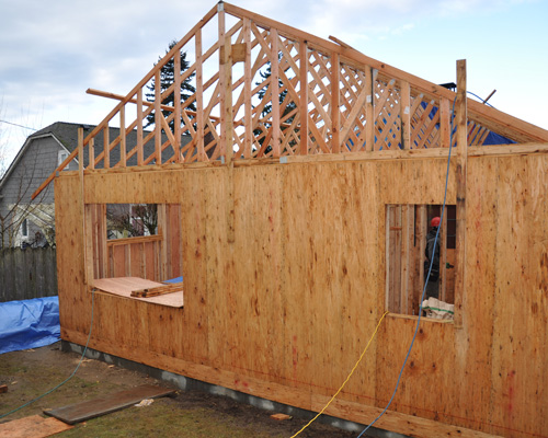 The addition takes shape as trusses are installed