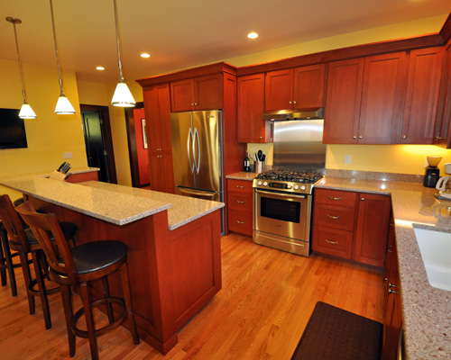 The kitchen has a lot of traditional detailing with all the modern conveniences.  The countertops are a quartz product by Cambria. Custom Seattle kitchen remodel