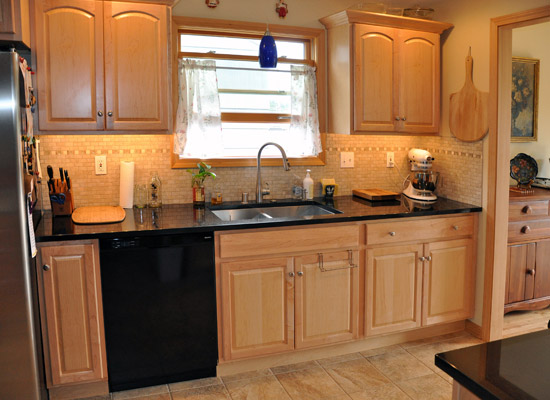 Finally, a cabinet that used to be near the stove is installed by the fridge to make space for a full-size dishwasher