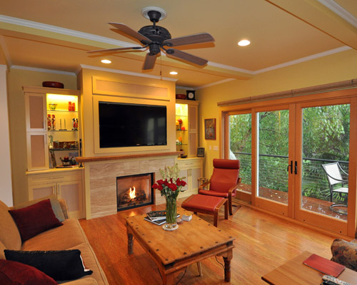 This room and the adjacent dining room, kitchen and all also benefit from new poplar flooring with an unusual and colorful patina. Repainting in all rooms, in some cases with lighter-colored paint, made for a refresh of all of the main floor common areas.