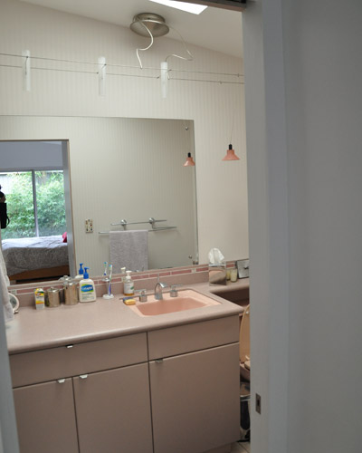 First, the master bath: it was pink, pink, pink and Corian.  Tiny, with a big need for updating, particularly in the cramped shower