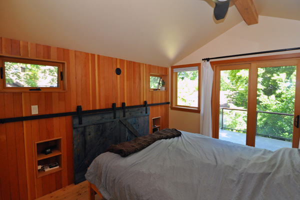 bedroom and spacious second floor deck