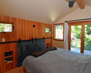 bedroom and spacious second floor deck