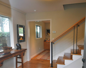Finishes were improved starting at the entry, with a complete rebuild of the stairs and railings