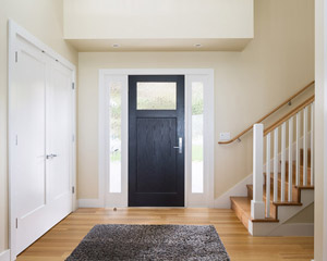 The entry, living room and upstairs rooms all share the same flooring: engineered rift and quartered white oak by Shamrock