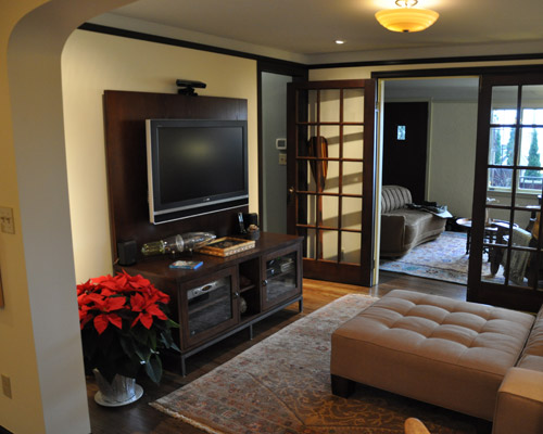 Where there was once a wall, there are now French doors from the media room into the dining room.  Circular floor plan complete, finishes true to the original, and a home that is now raring to go for entertaining