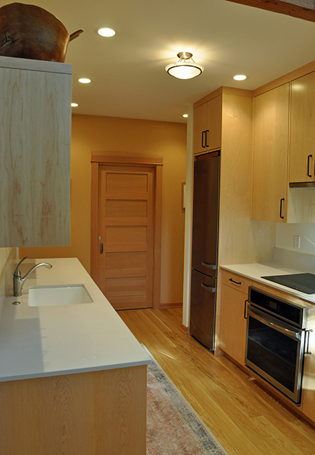 view of kitchen sink stove and fridge