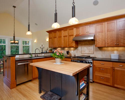 Custom cherry cabinets and Obsidian Paperstone countertops classic and modern at the same time