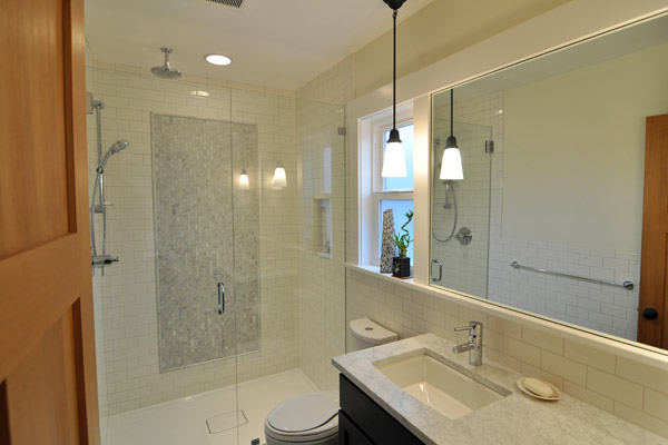 The result is a functional, beautiful bath with entry doors here and at the closet reclaimed from the original room. Now it’s time to dive into that retirement full time