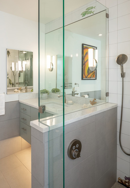 view of shower and vanity