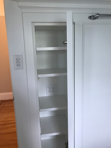 hidden cubby in bath wainscot