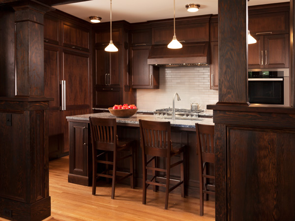 walnut custom kitchen cabinets with Azul Aran granite counters