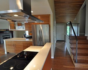 The Caesarstone cap on the raised wall defines the room while tying it into the rest of the countertops