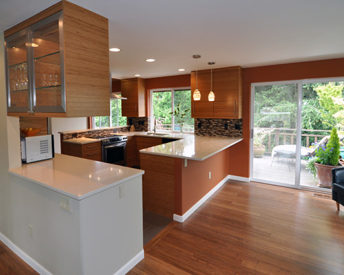 A new lighting plan utilized some of the existing can lights in the kitchen, and added some additional can lights to reflect the new floor plan