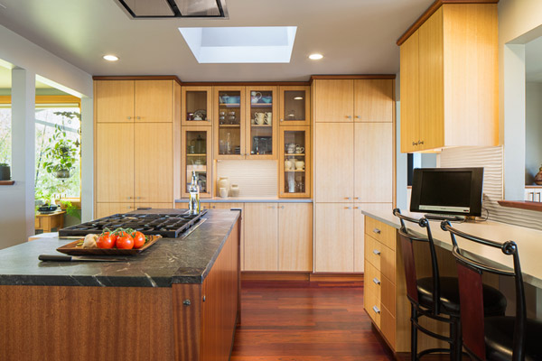 What makes these truly custom, though, is the addition of sapele to the cabinets and building the entire island in that same mahogany