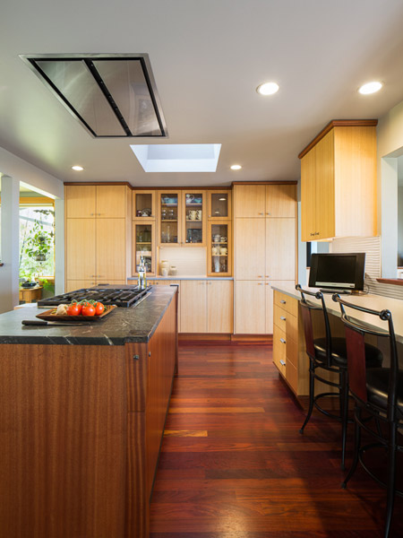 All of the perimeter counters are in quartz, with under-cabinet lighting