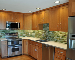 With just a few added can lights and some under-cabinet lighting, the entire kitchen is well lit and much more functional