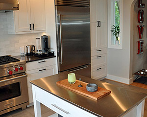 view of island and refrigerator in Seattle kitchen addition