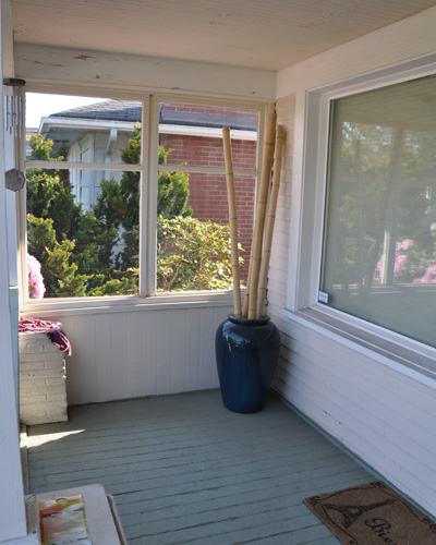 The spacious porch area had become a haven for spiders and essentially unusable.  Time for some remodeling